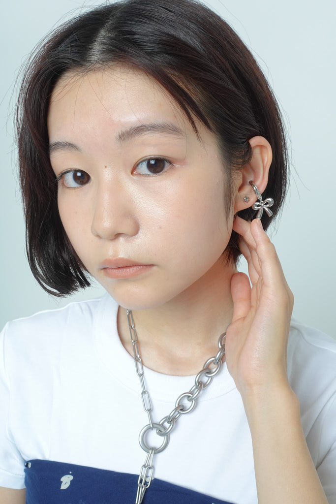 <tc>Motif ear cuff ( ribbon )</tc>