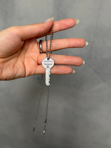Open key necklace
